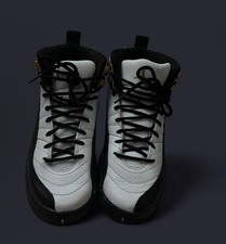 Air Jordan 12 Retro Black and Gold Sneakers