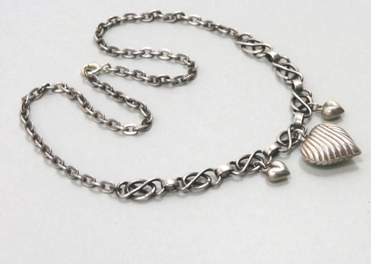 CIONDOLO CORBULA SARDA IN ARGENTO Diametro 10mm