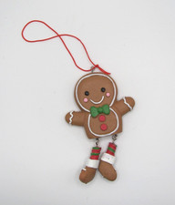 NWOT RESIN GINGERBREAD MAN COOKIE W/ GREEN TIE  HANGING LEGS CHRISTMAS ORNAMENT