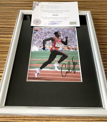 Carl Lewis Autograph winning '84 Olympic Games-Framed-COA-Brand New 22cmx32cm
