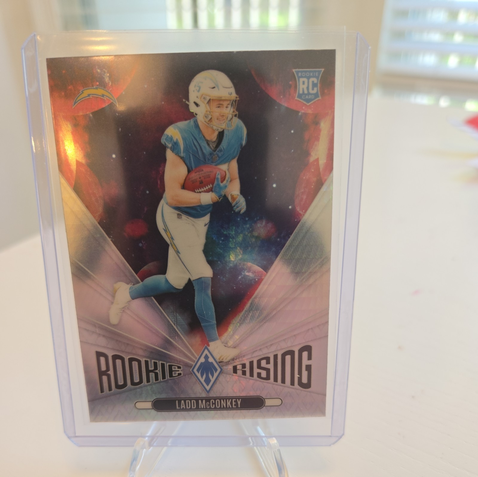 2024 Panini Phoenix Football Ladd McConkey Rookie Rising Silver Wave SP Chargers
