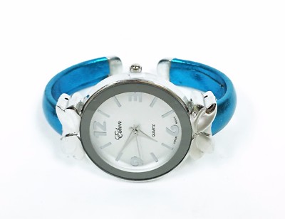 NEW EIKON METALLIC SILVER TONE,MIRROR BEZEL,BOW BLUE CUFF BANGLE LADY'S WATCH 