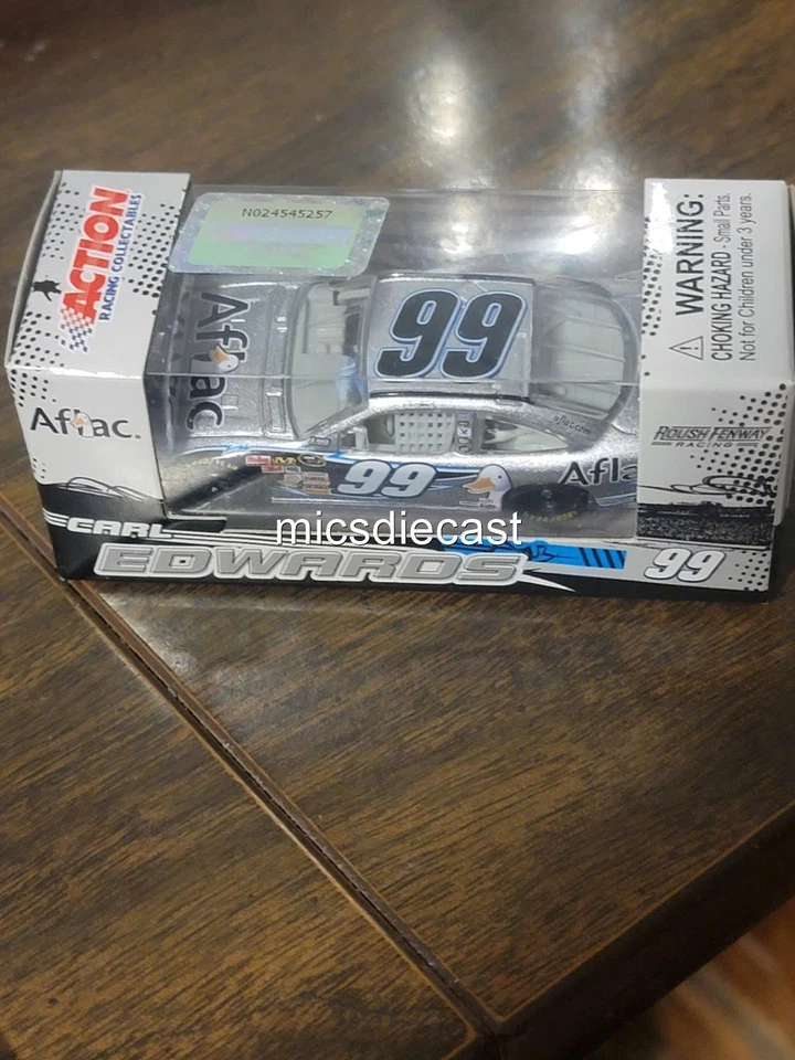 XRARA CUNA 2009 Carl Edwards #99 Night Silver Aflac 1:64 acción diecast Roush nueva en caja Foto 2 de 4