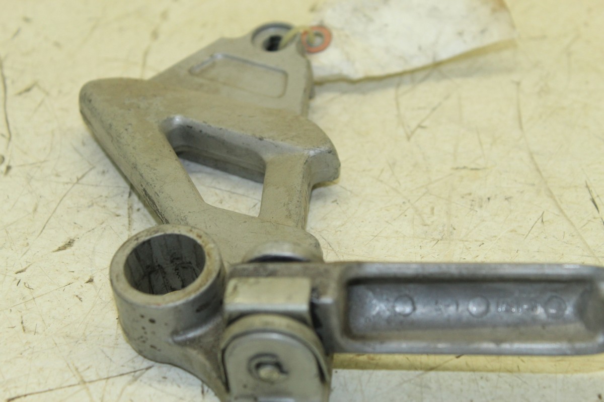 93 01 KAWASAKI NINJA ZX11D OEM ZX11 LEFT REAR PEG W BRACKET