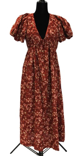neiman marcus burgundy dress Cold shoulder, very cool dress. New from Schiaparelli, a ribbed knit burgundy dress features draped off-the-shoulder sleeves and piercings at the bust. This Spring welcome a sophisticated sexiness from Daniel Roseberry. Explore