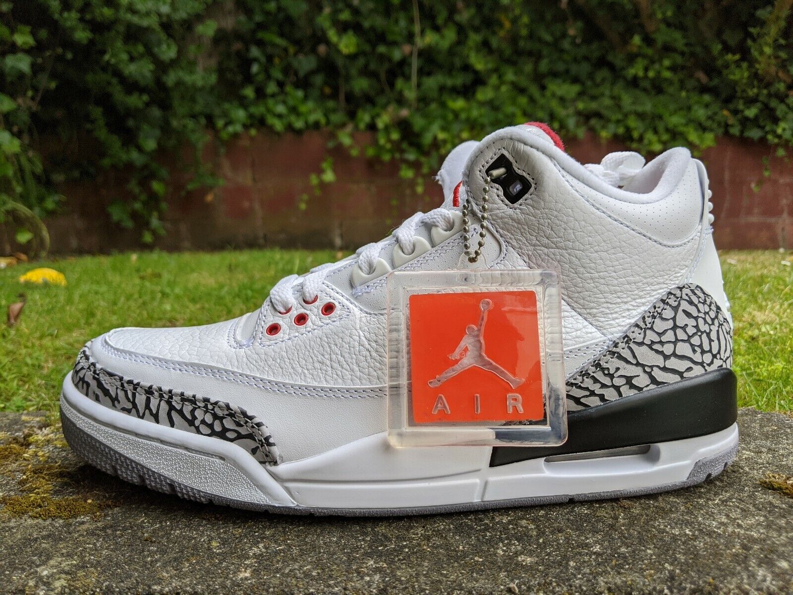 grey and white jordan 3