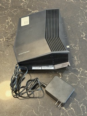 NETGEAR Nighthawk CAX80 AX6000 8-Stream Wi-Fi 6 Cable Modem Router