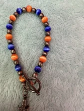 Alternating Orange/ Blue Moon Glow Bead Bracelet 7 Inch’s/ Florida Gator Charm