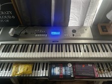 Yamaha YPG-235 76-Key Electronic Keyboard Silver Built-in Speaker LCD Display