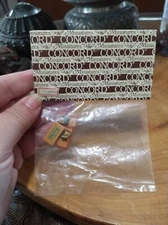 Vintage 1970s Concord dollhouse miniature accessories. Wood mouse traps