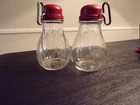 TWO Vintage Red and Glass Nut Choppers...One is Federal...Grinders clean