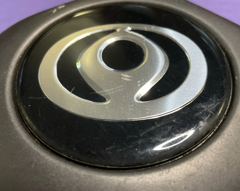 Оригинальные черные центральные колпаки колес для пикапа Mazda B3000 B2600 1998-2010 годов выпуска - Изображение 3 из 4