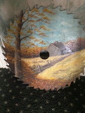 saw blade with farm Scene painted on it