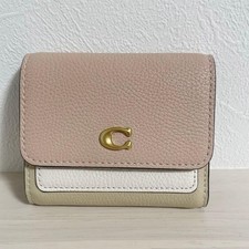 New and unused coach tri fold wallet pink white bi color