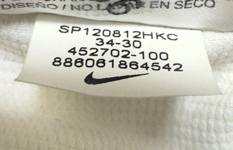 Pantalones Dri-Fit Nike Golf Tour Performance para hombre 34x30 beige crema frente plano Foto 4 de 4