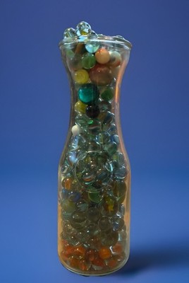 Vintage Glass Marble Collection in Milk Bottle