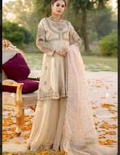Pakistani Indian Designer peplum frock with gharara pants. Wedding Eid party