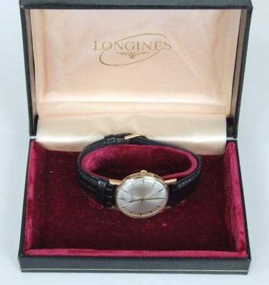 Longines: a gentleman's gold bracelet watch | Olympia Auctions