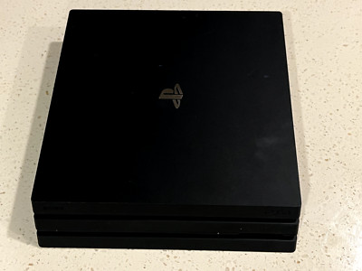 Sony PlayStation 4 Pro 1TB Console with 2 Wireless Controllers