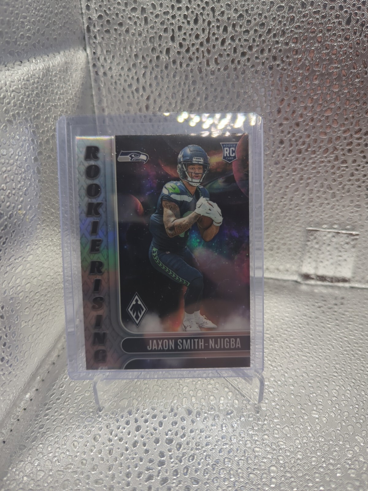 2023 Panini Phoenix - Rookie Rising #RIS-9 Jaxon Smith-Njigba (RC)