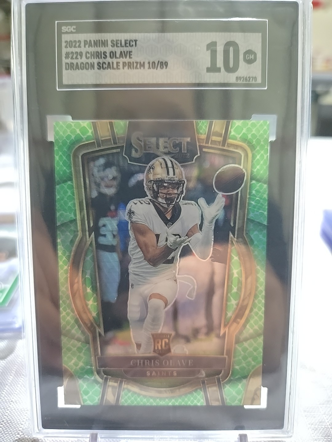 2022 Select Chris Olave Club Level Dragon Scale Prizm Rookie RC #/89 Saints