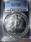 1987 $1 AMERICAN SILVER EAGLE PCGS MS69 CLASSIC BLUE LABEL