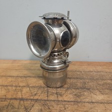 The Badger Brass Solar Carbide Bicycle Lamp with Red & Green Glass