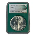 1987 $1 Silver Eagle NGC MS69. From U.S. Mint Sealed Box, green holder 8B