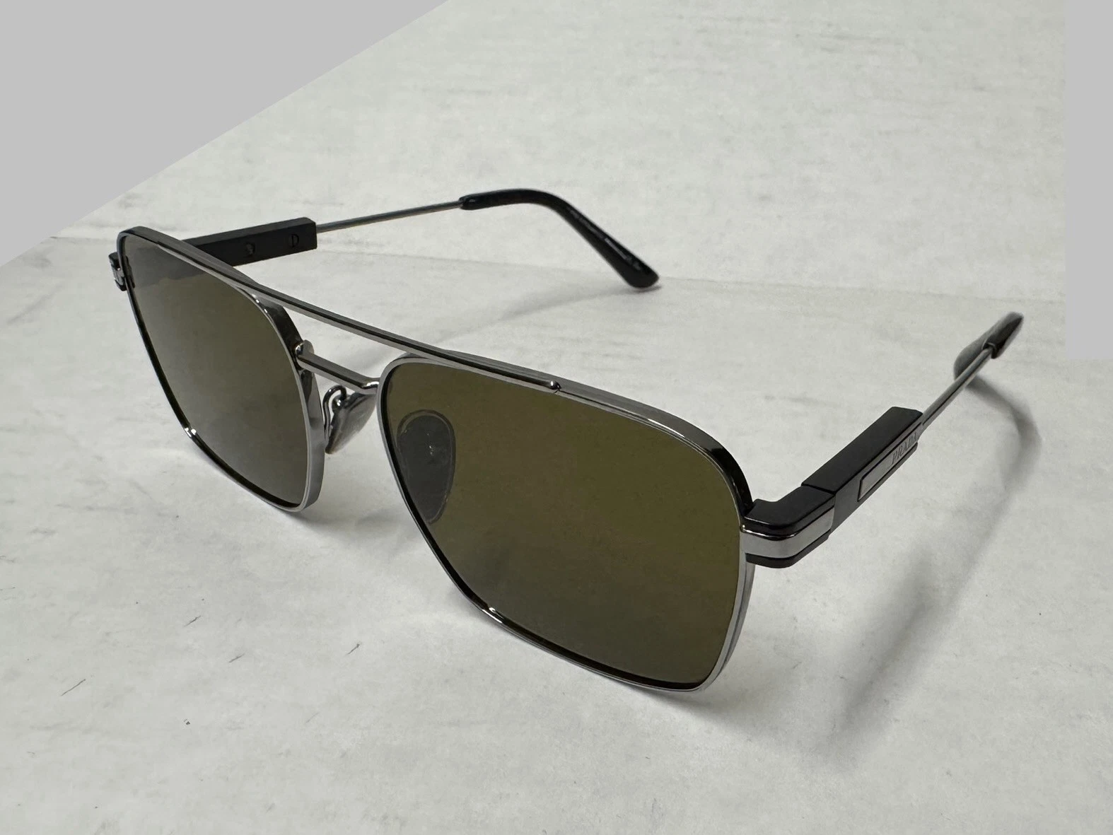 Prada — PRADA PR 67ZS 1BC5W1 Silver Polar Grey Gradient Polarized 56mm Unisex Sunglasses