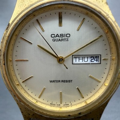 Casio MQ-514 Watch Men 33mm Silver Dial Gold Tone Round Daydate 