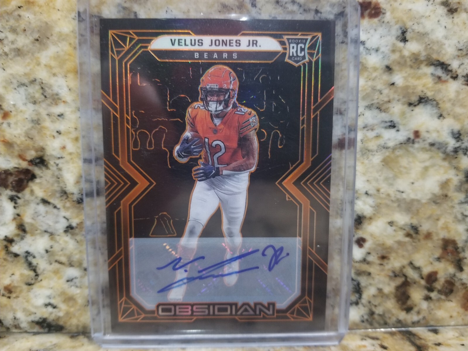 2022 Obsidian Rookies Electric Etch Orange /75 Velus Jones Jr Rookie Auto 