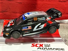 SCX 1/32 Scale Advance 2.0 4x4 Toyota Yaris WRC - Rally Swede lights E10529X300