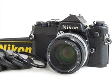 EXC Nikon FE 35mm SLR film Camera Black w/ Ai Nikkor 50mm f/1.8 Lens 5735
