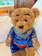 This is a Disney Aladdin Genie plush teddy bear from the Broadway musical.