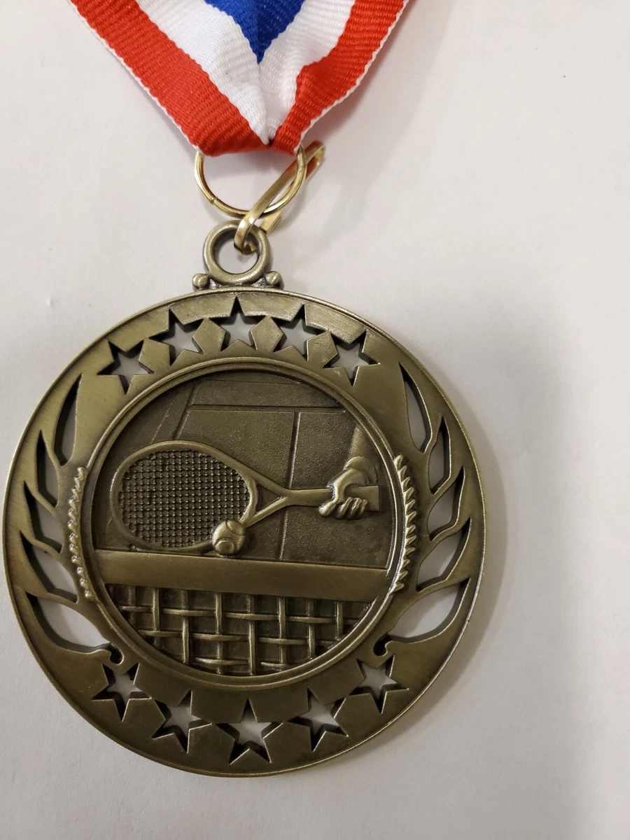 Gold tennis medal, 2 3/8" diameter, with red, white & blue neck ribbon,  engraved