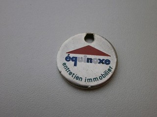 jeton de caddie métal " EQUINOXE ENTRETIEN IMMOBILIER"