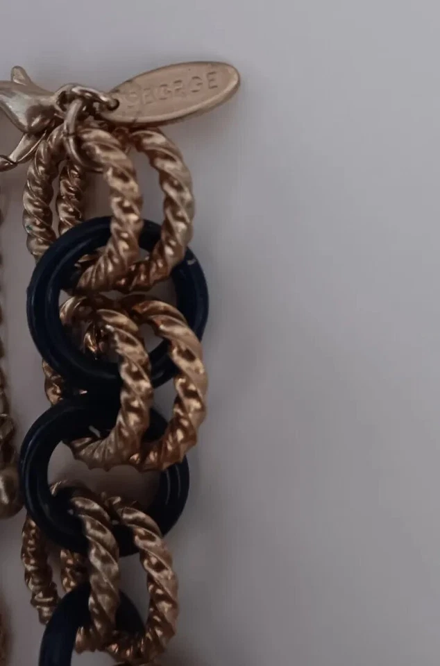 Collar George Círculos Azul Oscuro a través de Anillos Texturizados Tono Dorado Foto 2 de 2