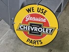 VINTAGE WE USE GENUINE CHEVROLET PARTS  PORCELAIN SIGN 12"