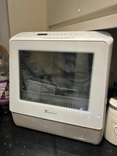 table top dishwasher no plumbing.  still in unopened box. never used.