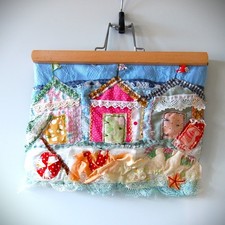 Beach Huts. Hand Stitched textile art using upcycled fabrics