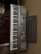 Yamaha YPT-310 Electronic 61-Key Keyboard - condition: used, sheet stand include