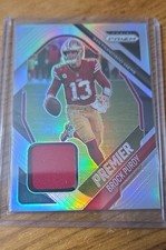 2025 Panini Prizm - Premier Jerseys Brock Purdy #PJY-BPY (MEM)