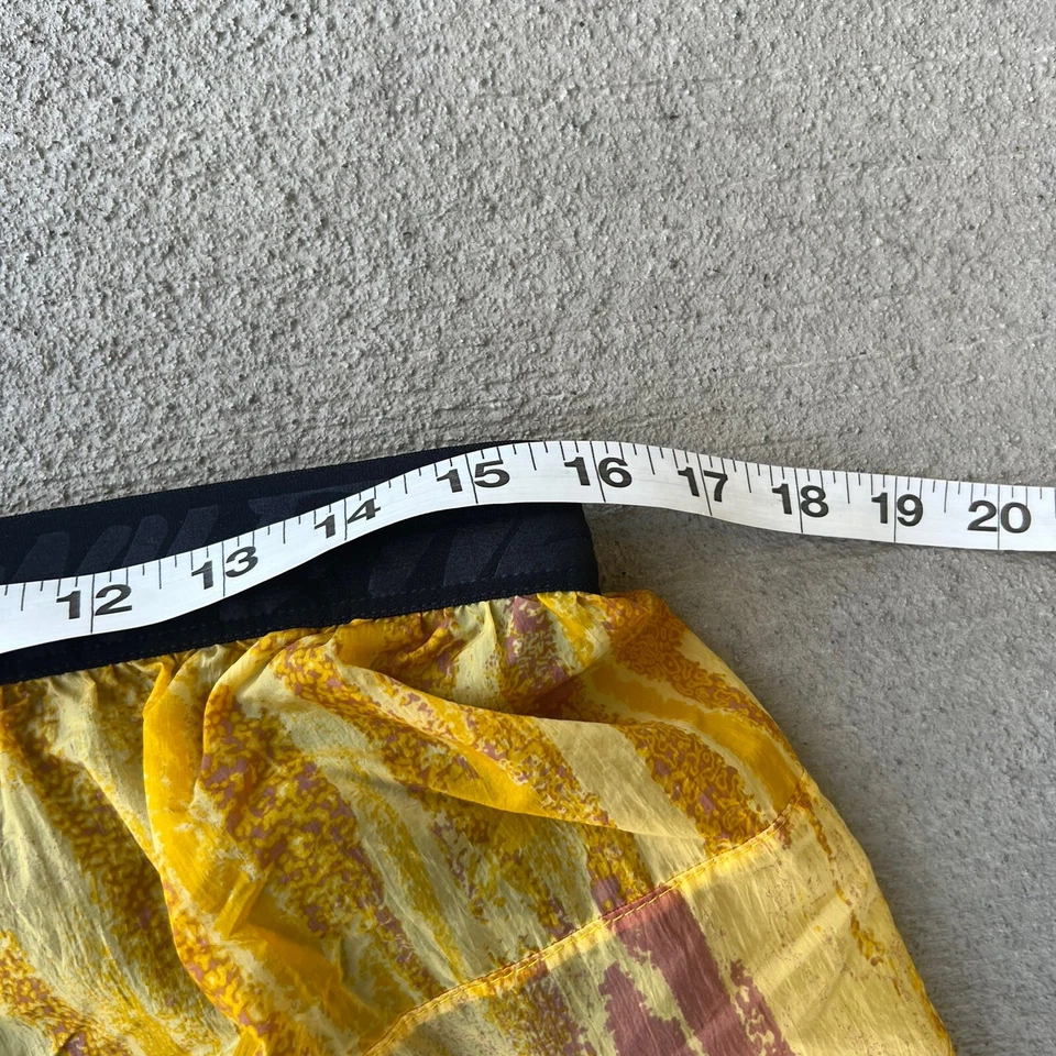 Pantalones cortos para correr 2 en 1 Nike Flex Stride Wild Run para hombre estampado citrón talla grande Foto 4 de 4