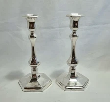 Pair of Edwardian sterling silver candlesticks by Horace Woodward & Co, 1903.