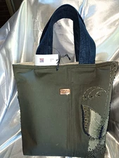 Beautiful Hand made ButterflyThemed purse. Sturdy yet elegant.