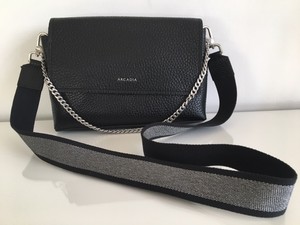 black and silver crossbody bag