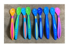 9 DIFFERENT COLORS OF USED FEEDING PLASTIC SPOONS FOR KIDS