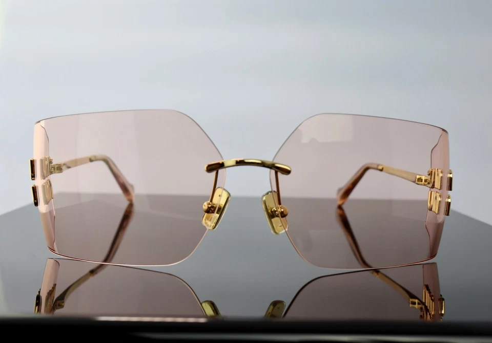 Gafas de sol Miu Miu Runway SMU54YS ZVN20F doradas/marrones claros lentes sin montura 100 % UV Foto 2 de 4