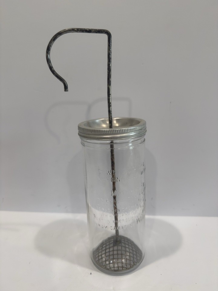 A genuine MCM Wesson Oil glass mayo maker — a beautifully branded, all-in-one glass jar-and-whisk gadget that actually works and doubles as a conversation piece on any kitchen shelf.