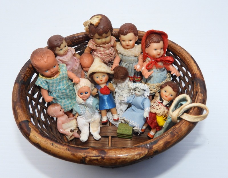 Basket of 12 vintage retro antique miniature dolls.  Interesting Variety.